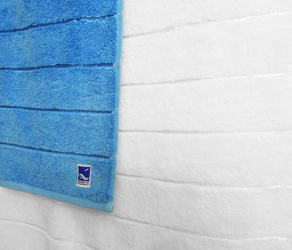 Thick, soft and elegant bathroom towels in sky blue